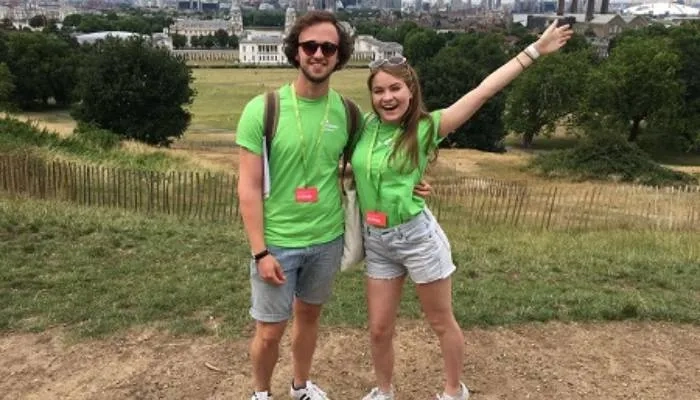 Two people posing at camera